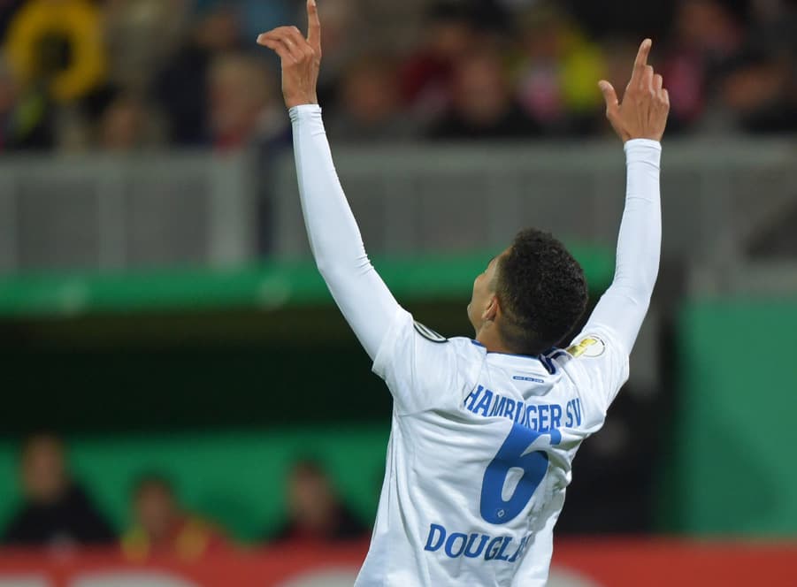 A rare moment for Douglas Santos as he celebrates his goal in added time to make it 3-0
