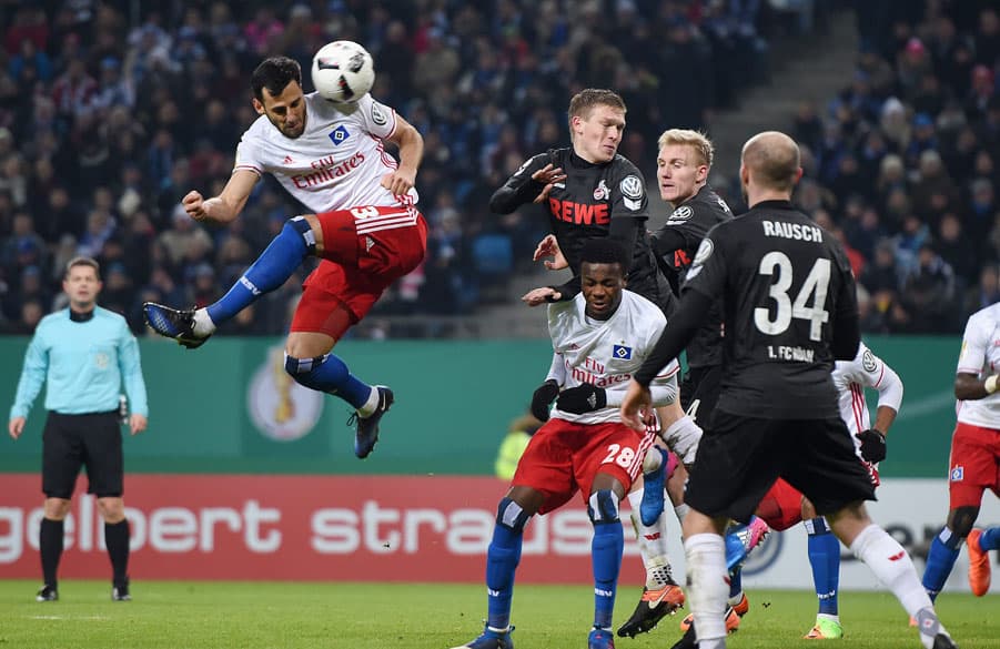 Mavraj in an aerial dual against his former team.