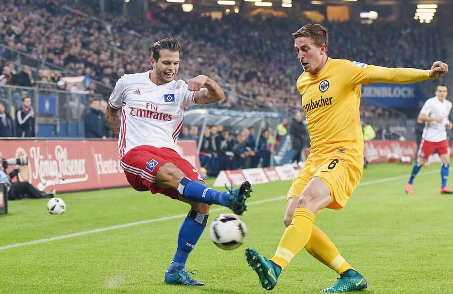 Dennis Diekmeier challeging against Frankfurt.