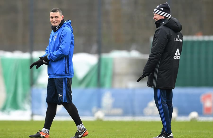 Kyriakos Papadopoulos with Markus Gisdol during training.