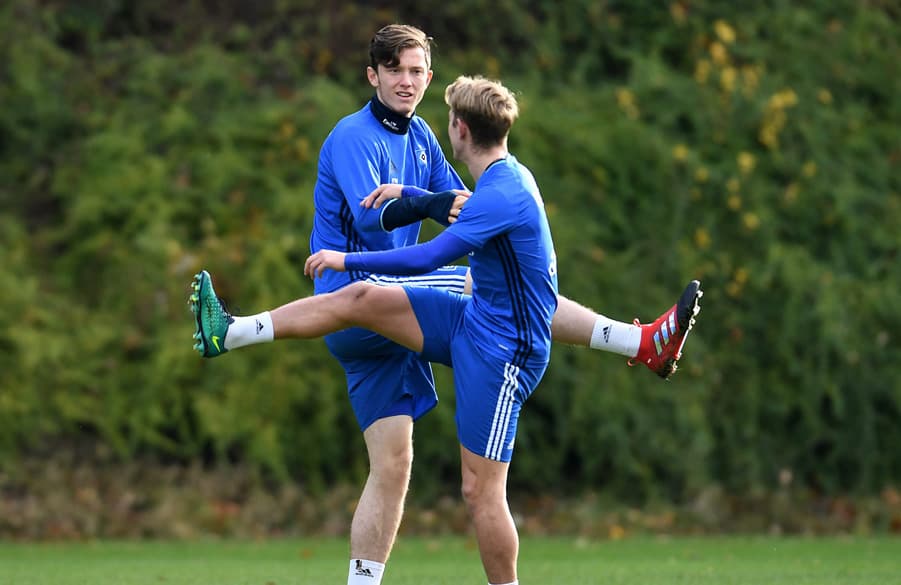 Lewis Holtby and Michael Gregoritsch warming up.