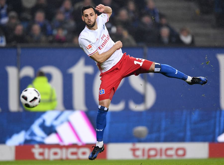 Mergim Mavraj goes for goal.