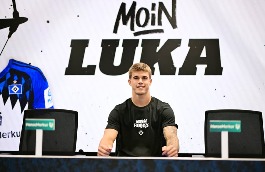 Luka Vuskovic sits at the press conference podium