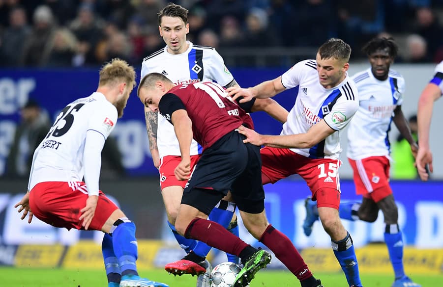Stark im Spiel gegen den Ball: Die Rothosen um Timo Letschert, Adrian Fein und Jordan Beyer im gestrigen Duell mit Nürnberg.