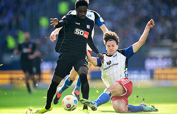 Both teams got stuck in during a scrappy game featuring three-set piece goals.