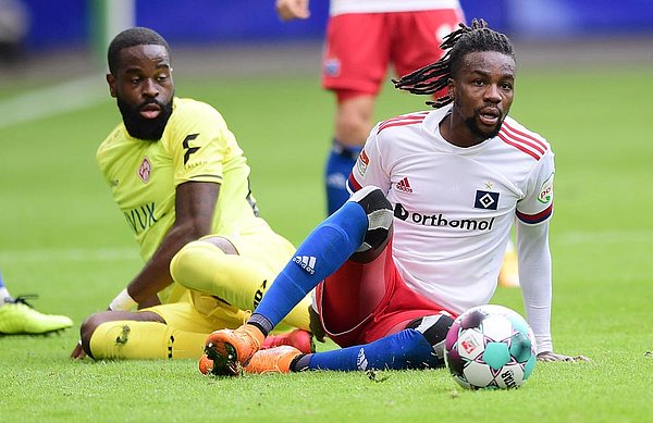 Ridge Munsy (l., during HSV's 3-1 win at the Volksparkstadion in October) has scored four in his last four.