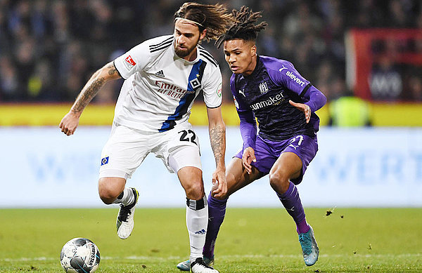 Felix Agu, pictured here in the reverse fixture in November with Martin Harnik, has been standout at left-back for Osnabrück, earning a summer move to Werder Bremen.