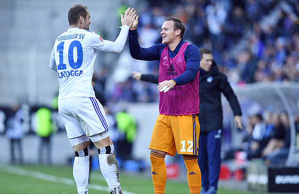 Pierre-Michel Lasogga scored once again and set up the second goal as he celebrates with good mate Tom Mickel