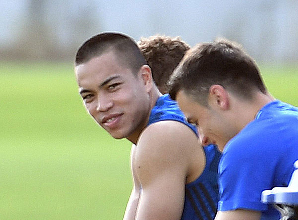 Bobby Wood with team mates on a training bench in Dubai. 