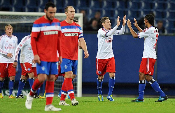 The scheduling of the 2011 friendly at the Volksparkstadion limited the attendance from both sides, with an impressive 1,000 still making the trip over on a Tuesday night.
