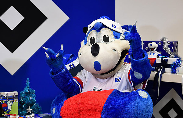 Ließ sich den Spaß nicht nehmen: Selbstverständlich war auch HSV-Maskottchen Dino Hermann bei der digitalen Lesung dabei. Ließ sich den Spaß nicht nehmen: Selbstverständlich war auch HSV-Maskottchen Dino Hermann bei der digitalen Lesung dabei.
