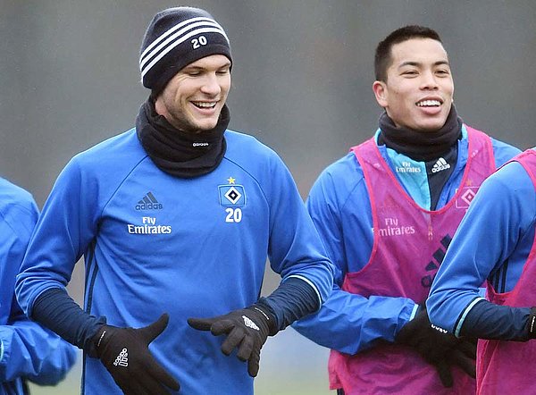 Albin Ekdal and Bobby Wood jogging together.