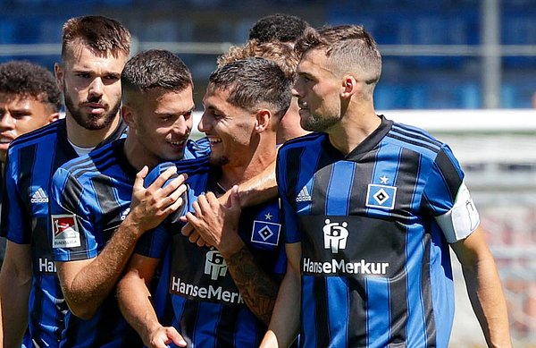 Goal scorers Ludovit Reis and Laszlo Benes celebrate together. 