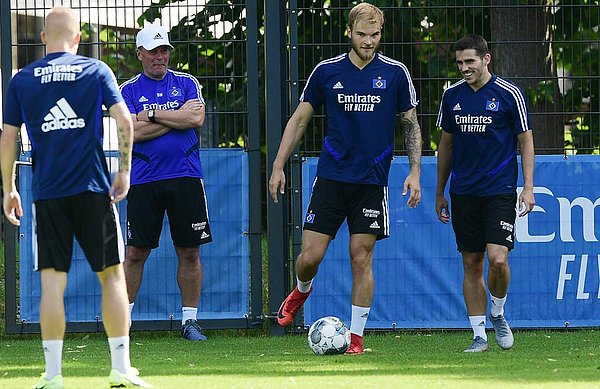Sussing him out: Dieter Hecking runs the rule over new signing Timo Letschert during his first training session.