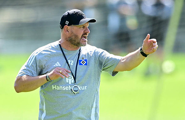 Steffen Baumgart giving clear instructions to his players.