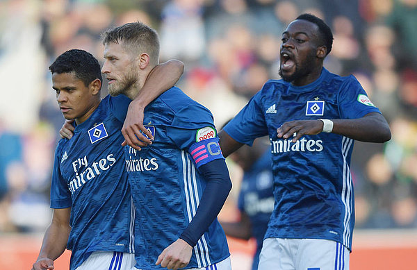 Everything was going well after the opening goal. Goalscorer Aaron hunt celebrating with Douglas Santos and Khaled Narey.