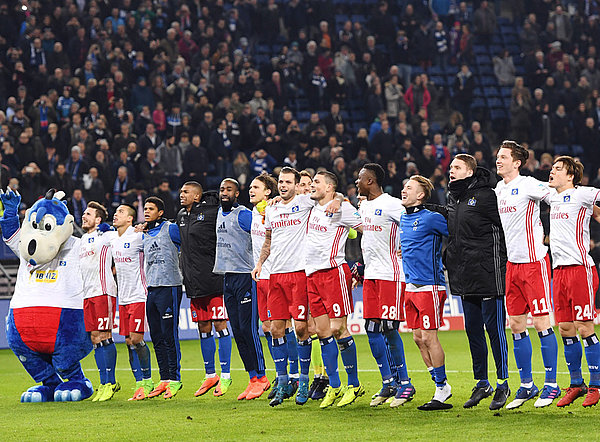 The team celebrating with their fans at the Volksparkstadion.