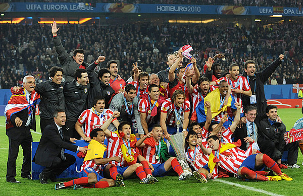 Atletico Madrid celebrate their Europa League win in 2010. At the centre with the cup in his hands is Diego Forlan, who scored twice in the game.