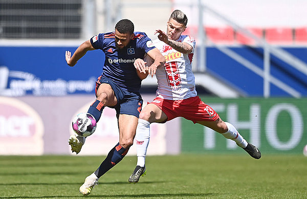 Fifty-fifties was the name of the game in the first half with both teams battling hard. Fifty-fifties was the name of the game in the first half with both teams battling hard.