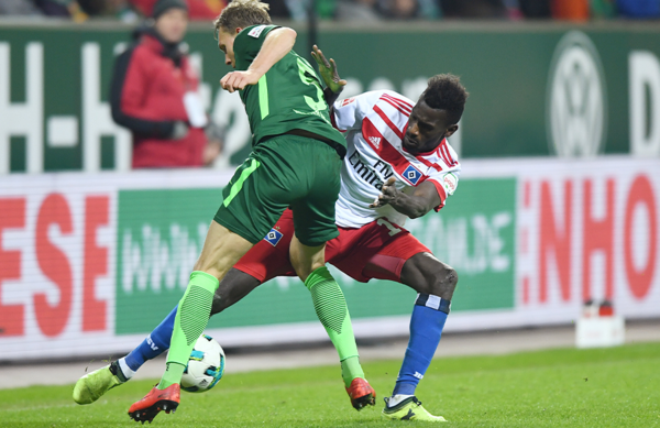 Jatta battling it out in the last meeting between the sides. Jatta battling it out in the last meeting between the sides.